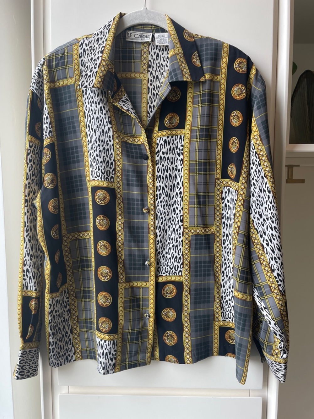 Le Caviar Mixed-Print Button-Up Blouse, Padded Shoulder, Covered buttons. EUC